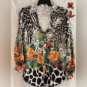LADIES BLACK & WHITE TOP WITH ORANGE & GREEN FLOWERS